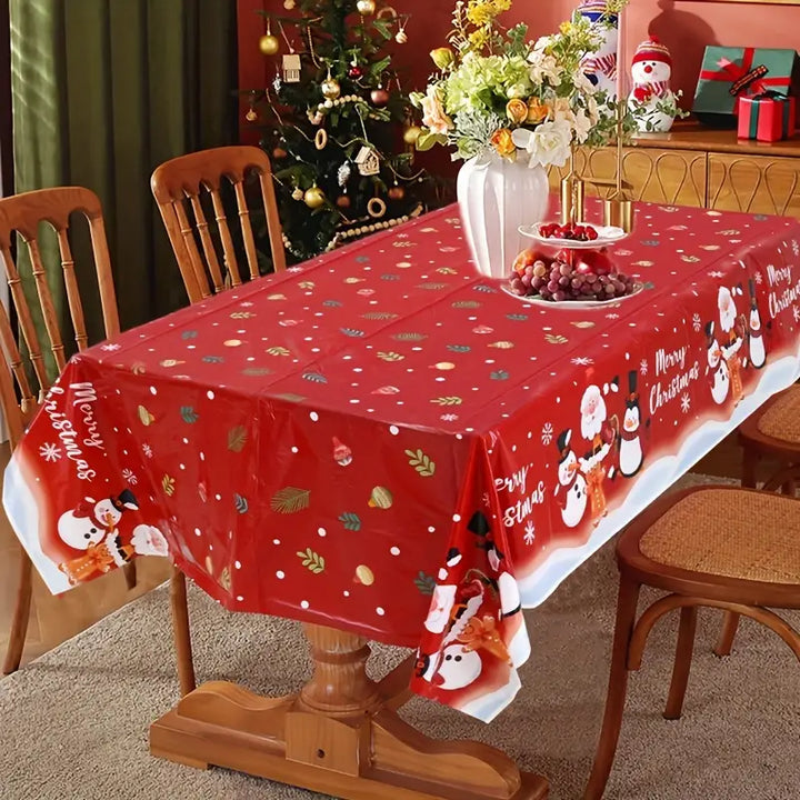 Christmas Celebration Tablecloth – Festive Fun with Santa, Snowman & Penguin!